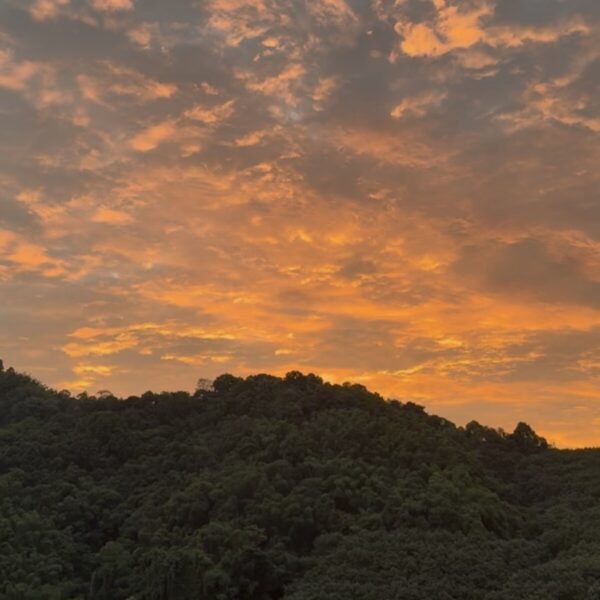 Golden summer sunset over the mountains of Northern Thailand